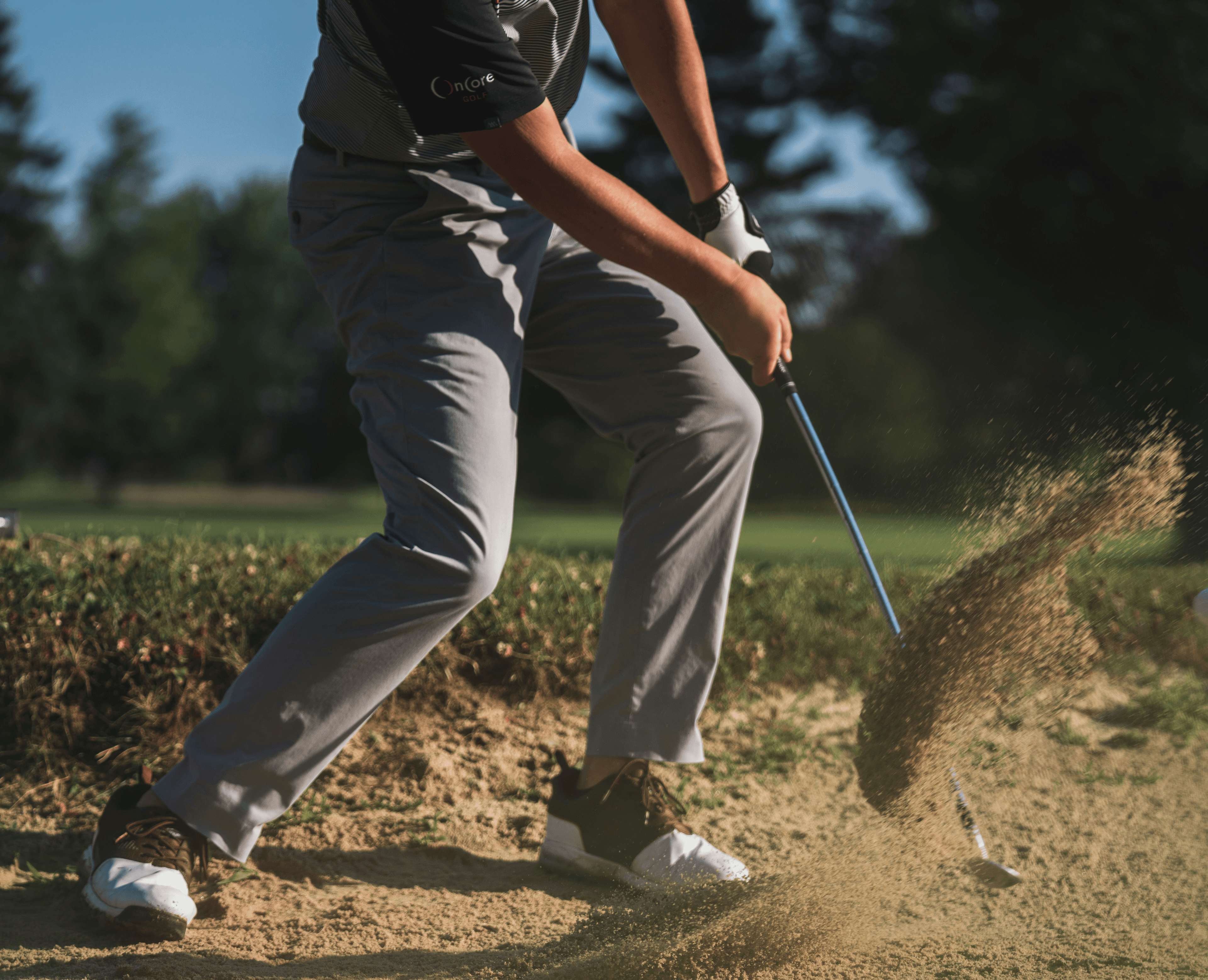 golfer in sandtrap